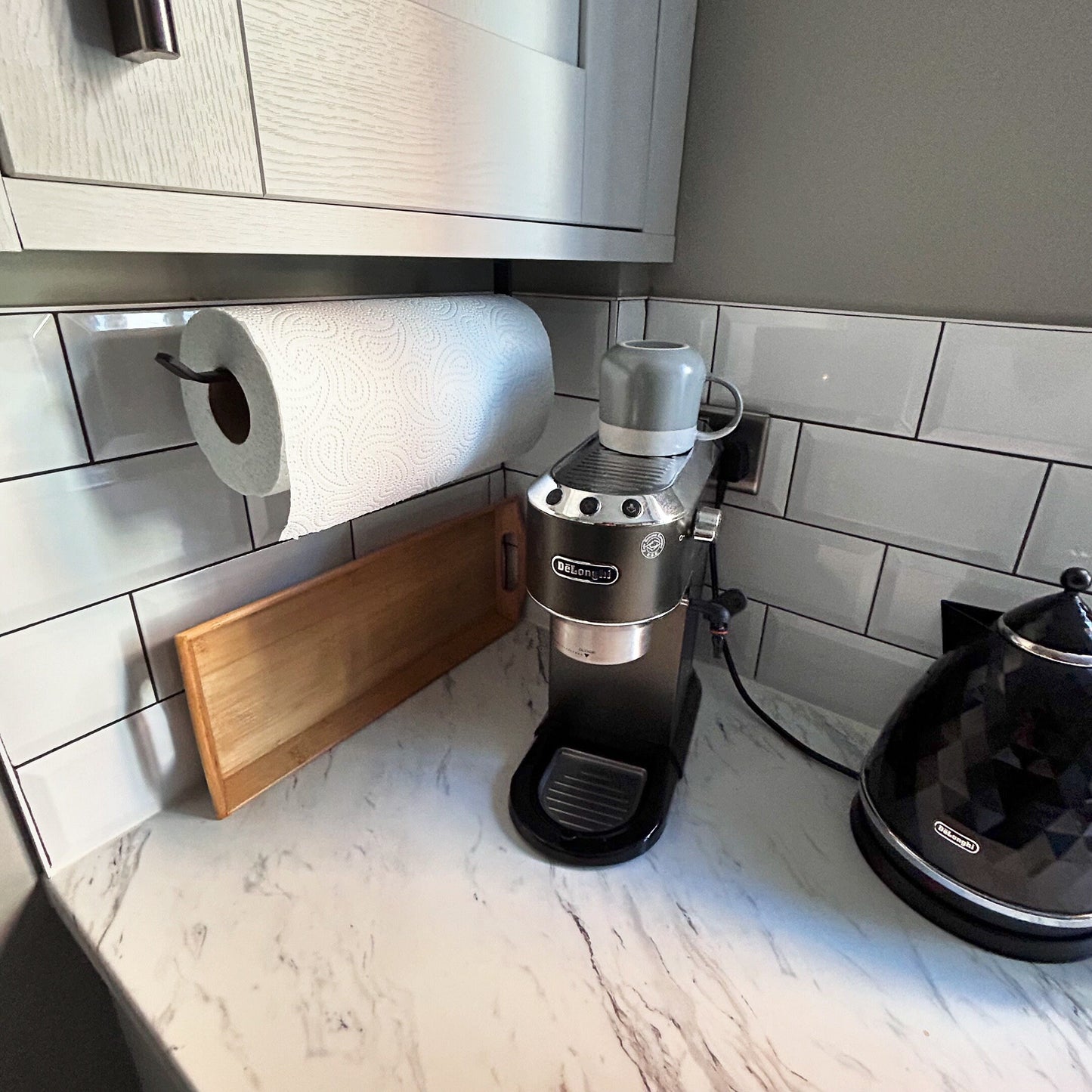 wall mounted kitchen roll holder. Can also be installed as an under cupboard kitchen roll holder. Great storage for kitchen towels.