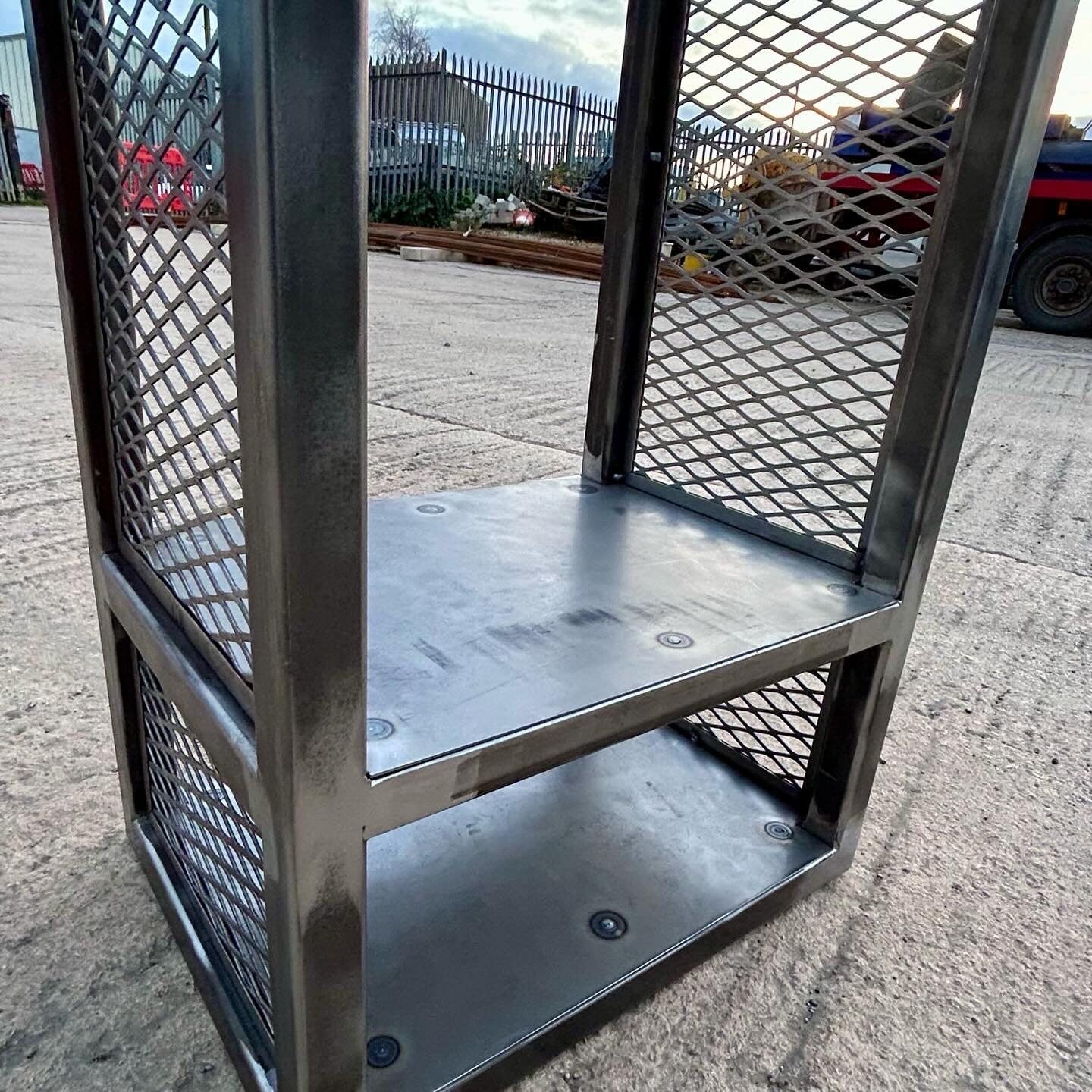 TrampWorks free standing firewood storage rack in its raw industrial finish. They can be powder coated to provide a modern contemporary decor feel.