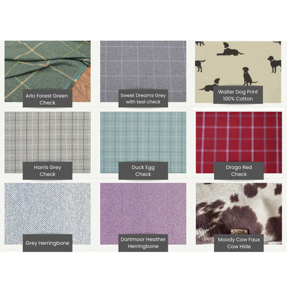 Collection of fabric swatches with various patterns and colours for our luxury pet beds.