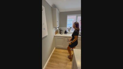 Under shelf kitchen roll holder installed under cupboard unit for great space saving.